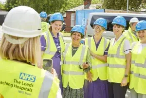 A selection of employees for the ground breaking moment - first diggers on site for the New Rob Burrow Centre for Motor Neurone Disease